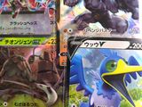several different types of pokemon cards are displayed on a table