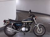 a motorcycle that is parked in a parking garage