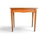 a small wooden table with a drawer on top of it
