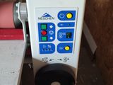 a machine that is sitting on a table in a room