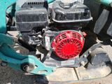 a small engine on the back of a tractor