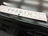 a sticker that says vauto on the top of a washing machine