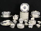a lot of blue and white dishes and cups and saucers