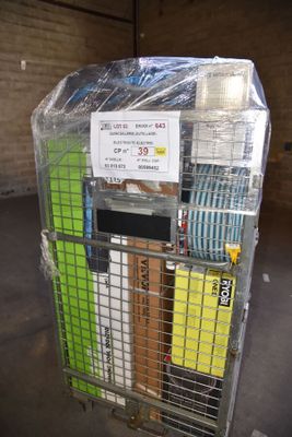 a metal cage with a bunch of books in it