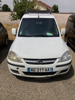 a picture of a white car parked in a parking lot