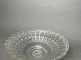 an image of a glass bowl sitting on top of a table