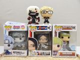three funky pop vinyl figures of anime characters on display in a display case