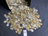 a lot of coins that are on the table