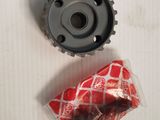 a picture of a gear and a bag of candy on a table