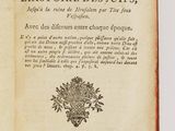 an open book with a black and white image of flowers on it