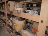many boxes and boxes on the shelves in the room