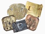 several different types of belt buckles are shown on a white background