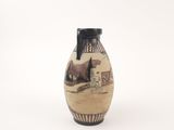 a vase that has a picture of a man and a dog on it