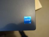 a close up of a laptop with a core sticker on it