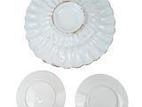 a white plate with a gold rim and a white plate with a gold rim