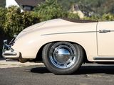 a beige car parked on the street in front of a house