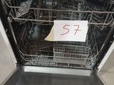 a dishwasher that has a sign on it