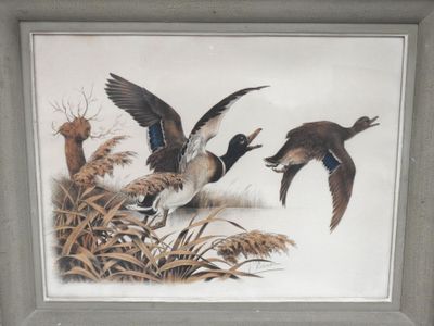 une photo d'un tableau représentant des canards en plein vol