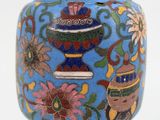 a blue vase with a colorful design on it