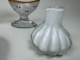 two vases that are sitting next to each other on a table