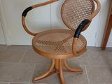 a chair that is sitting on the floor in the room