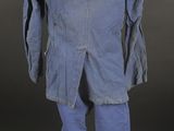 an image of a blue jacket and pants on a mannequin stand