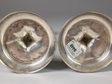 pair of antique silver plated dishes with labels on them