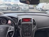 dashboard view of a car with a lot of cars in the background
