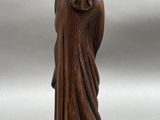 pair of chinese carved wood figures of a man and a woman