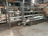 a lot of shelves that are in a warehouse