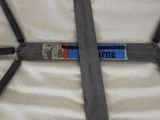a close up of a pair of straps on a bed