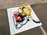 a bunch of wires and cords laying on a piece of paper