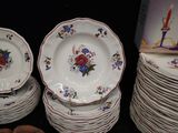 a lot of plates that are stacked on top of each other