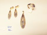three different types of jewelry are displayed on a white surface