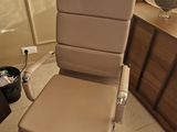 a chair that is sitting in the corner of a room