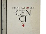 an open book with a picture of a red heart on the cover