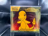 un gros plan sur un boîtier de CD sur lequel figure un personnage de Pokémon
