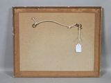 a picture of a piece of paper with a tag hanging from it