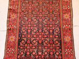 an antique persian rug on a white background