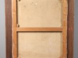 an old wooden easel with a painting on top of it