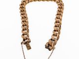 a close up of a chain with a lock on it