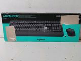 a box with a computer keyboard and mouse in it