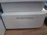 a white box with the words hp envy inspire on it
