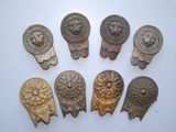 six antique brass door knobs with lion heads on them