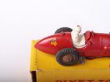 a toy car that is sitting on top of a box