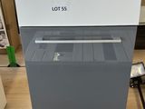 une photo d'une machine du lot 55 qui est exposée