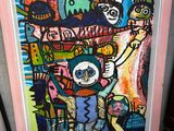 tableau représentant une femme et un chat, dans un cadre rose