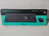 une image représentant une boîte contenant un clavier et une souris