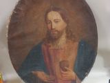 un tableau représentant Jésus tenant un livre posé sur une étagère