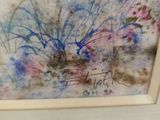 a picture of a painting on the wall of a room